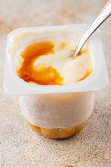 Rice pudding caramel syrup sweet dessert snack fresh delicious gourmet food background on the table rustic food top view copy space