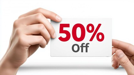 Close-up of hand holding out coupon with "50% off" text on clean white background, concept of promotions, sales and special offers.