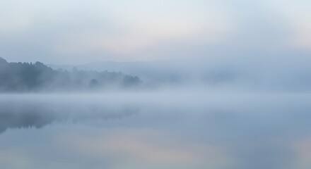 Fototapeta premium Gentle fog over a calm lake, soft gray and blue hues, tranquil texture
