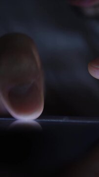 Smartphone and social network addiction concept. Hands using smartphone in bed at night