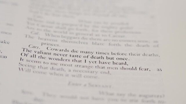 Page with "cowards die many times" line from Shakespeare's Julius Caesar