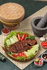 Ikan Nila Bakar. Grilled tilapia fish is a variation of grilled fish that uses tilapia as the main...