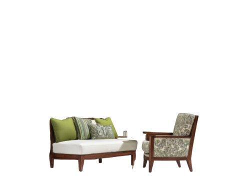 Elegant wooden furniture set featuring a sofa with green pillows and a patterned armchair. - Powered by Adobe