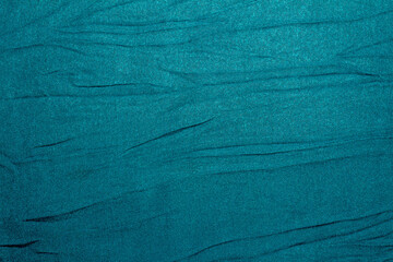 Wrinkled Blue Fabric Textures. The Rugged Texture Offers a Strong Visual Aesthetic, Suitable for Posters and Creative Projects.