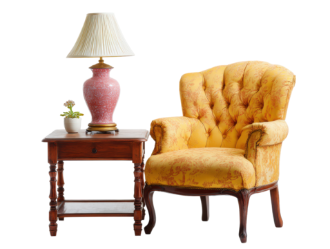 Elegant antique-style furniture group with a tufted yellow armchair wooden side table and pink ceramic lamp.