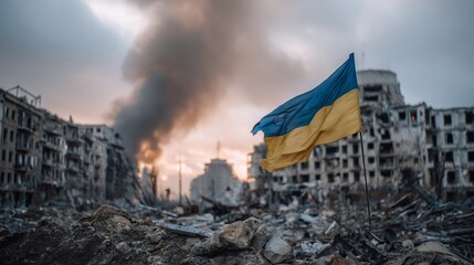 Ukrainian flag waves over war-torn city ruins, smoke and destruction. Used for news, memorials
