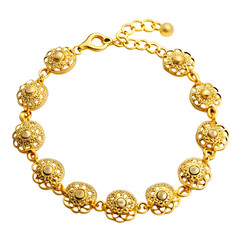 An elegant gold bracelet with intricate floral patterns, isolated on white background