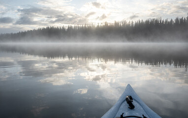 kayaking on a misty morning 
