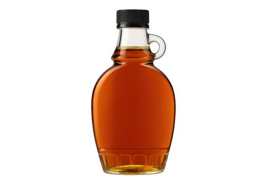 Glass bottle of maple syrup on transparent background