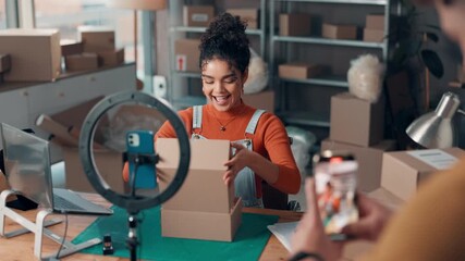 Woman, filming and ring light with sunglasses of startup, review product and online shopping. Business owner, phone and live streaming for ecommerce, promotion marketing and recording for sponsorship