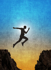Man leaping over the gap A symbol of overcoming obstacles and achieving goals.