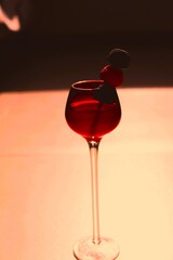 red wine pouring into glass