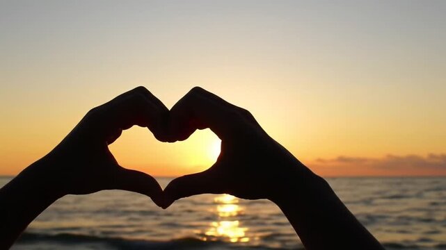 sunset in heart hands
By Romolo Tavani