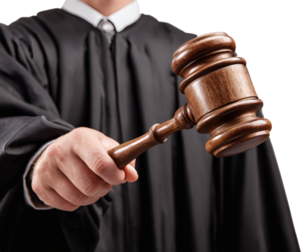 A judge holds a gavel, symbolizing legal decisions and the justice system.