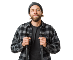 Happy man in a beanie and flannel, ready for a day of skiing in the snow.