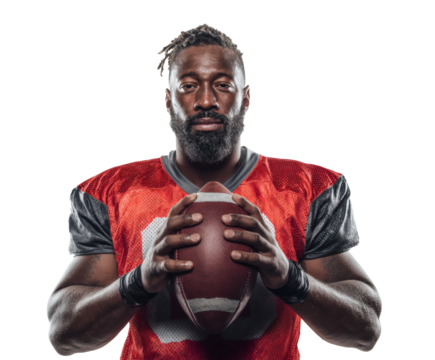 Strong football player looking at the camera with a focused gaze, ready to play.