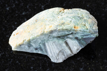 sample of raw trass chernomorite rock on black