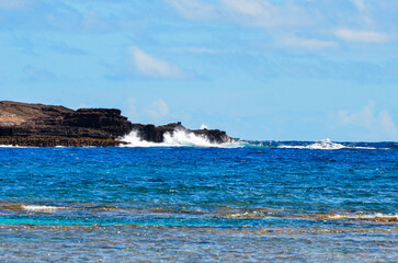waves crashing on rocks