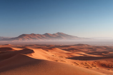 Naklejka premium stunning summer landscape featuring majestic sand dunes of morocco under clear blue sky