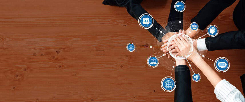 A diverse group of professionals showcases collaboration with joined hands amid digital icons that symbolize innovation, teamwork, and strategic communication in business. Amity - Powered by Adobe