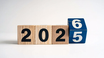 Countdown to 2026, celebrating the transition from 2025 with bold numbers on blocks