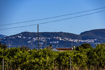 High mountains under clear blue sky in Gandia, Spain	
