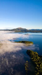Misty lake and mountain vista