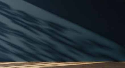 Sunlit Tranquility: Dappled Shadows on a Dark Teal Wall and Wooden Floor.