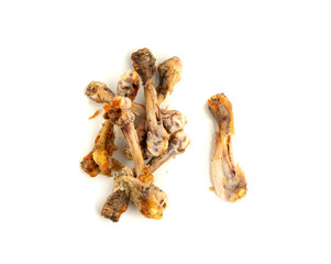 Chicken Leftovers, Unfinished Grilled Chicken on Dirty Plate Isolated, Meat Pieces and Bones after...