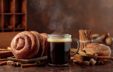 Swedish cinnamon rolls and mug of black coffee.
