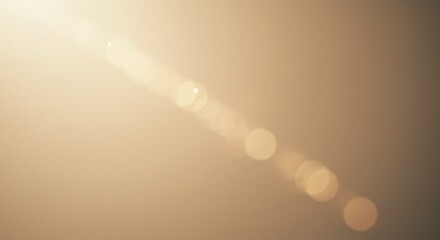 Dreamy Diagonal Sun Flare with Warm Haze and Bokeh Orbs