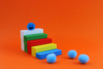 Leader plush ball overcoming stages, colorful wooden block ladder