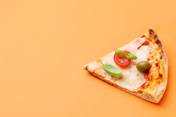 Slice of delicious pizza on orange background. Space for text