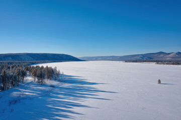 drone aerial photography captures serene beauty of siberian snowy plains on winter day