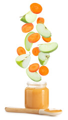 Baby food. Apple and carrot slices falling into jar of puree on white background