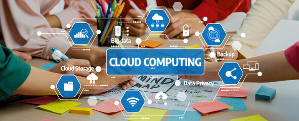 A vibrant and dynamic collaborative session focusing on cloud computing concepts, featuring diverse hands engaged in data mapping with sticky notes and digital icons. Amity