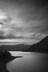 Black and white mountains and lake