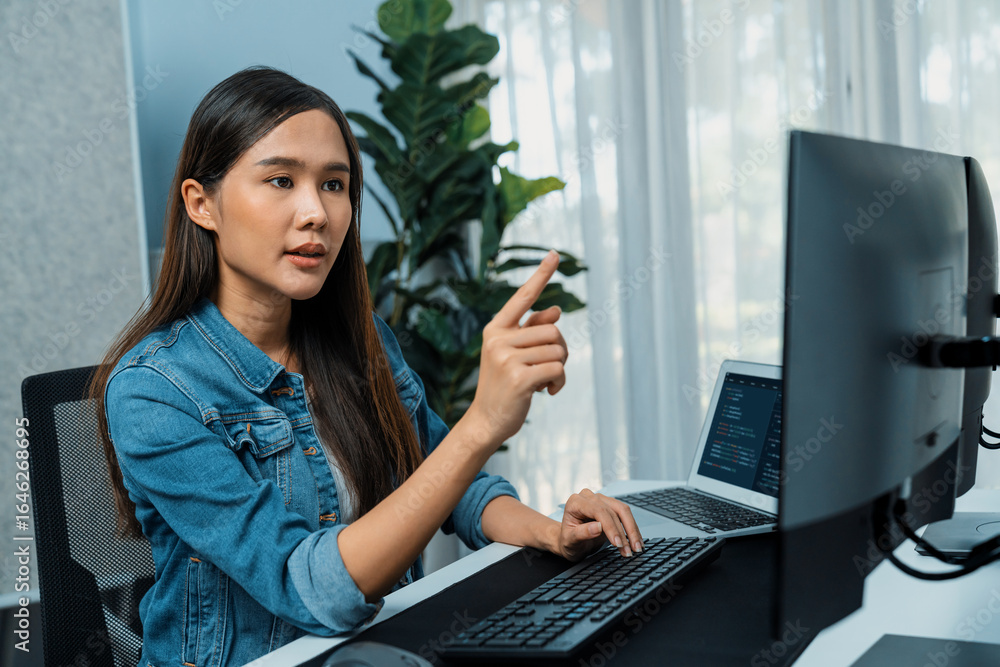 Poster young asian girl of it developer pointing online information on pc with coding program data applicat