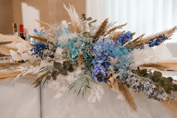 Elegant Wedding Table Centerpiece with Pampas Grass, Blue Hydrangeas and Eucalyptus. Neutral Boho...