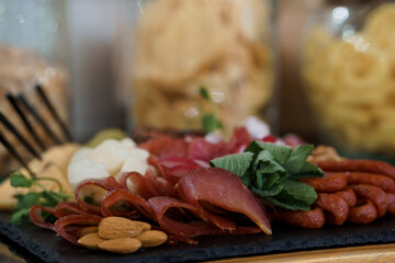 Charcuterie Board Assortment: Prosciutto, Salami, Almonds, Cheese, Herbs, Antipasto Platter, Wood...