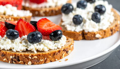 Multigrain toast with cottage cheese and fresh berries. Tasty snack. Delicious food for breakfast.