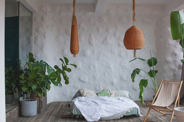 Cozy sustanable stylish bedroom with plants and natural elements for a serene luxury hotel vibe