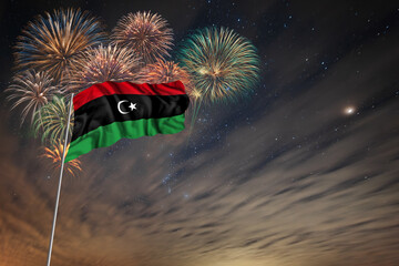 Waving National flag of Libya and holiday fireworks