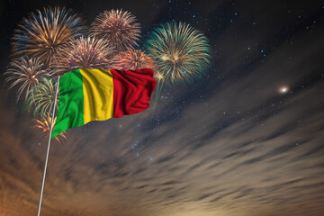 Waving National flag of Mali and holiday fireworks