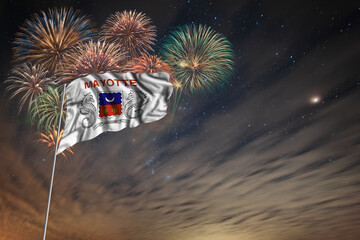 Waving National flag of Mayotte and holiday fireworks