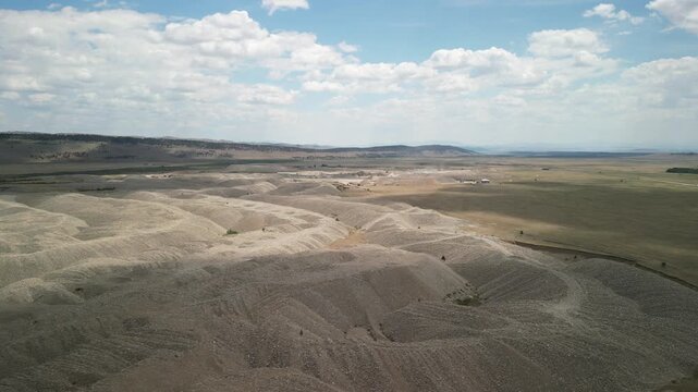 Aerial of dredge operations in Fairplay Colorado off of Highway 285 in summer