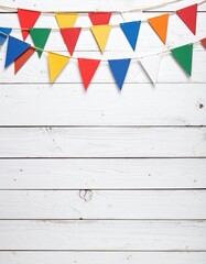 Colorful triangle bunting decorating white wooden wall for festive celebration