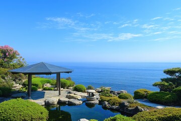 Fototapeta premium Tranquil coastal garden overlooking serene blue ocean under clear skies