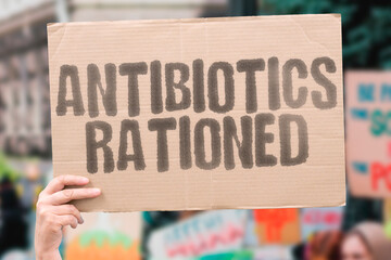 Antibiotics rationed. Banner questioning global drug inequality after the crisis. CAPITALISM....