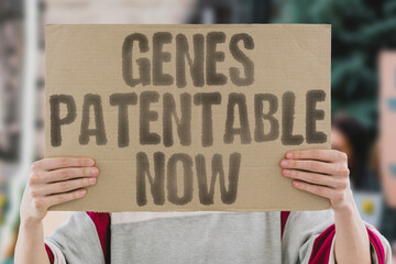 Protest banner challenges corporate claims over genetic material. JUSTICE. BIOTECHNOLOGY. EQUALITY....
